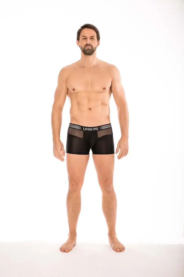 Boxer noir en résille transparente, ceinture élastique, vue de face, design audacieux et séduisant pour homme.