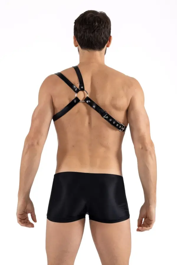 Harnais noir en simili cuir, vue de dos, avec sangles ajustables et anneau central, style audacieux pour soirées sexy.
